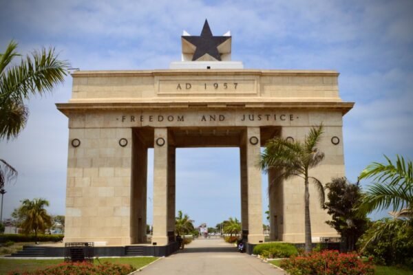 freedom arch with black star on top and freedom and justice inscribed