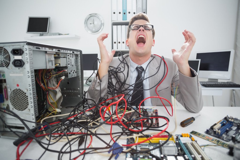 photo of male showing frustration over complex job