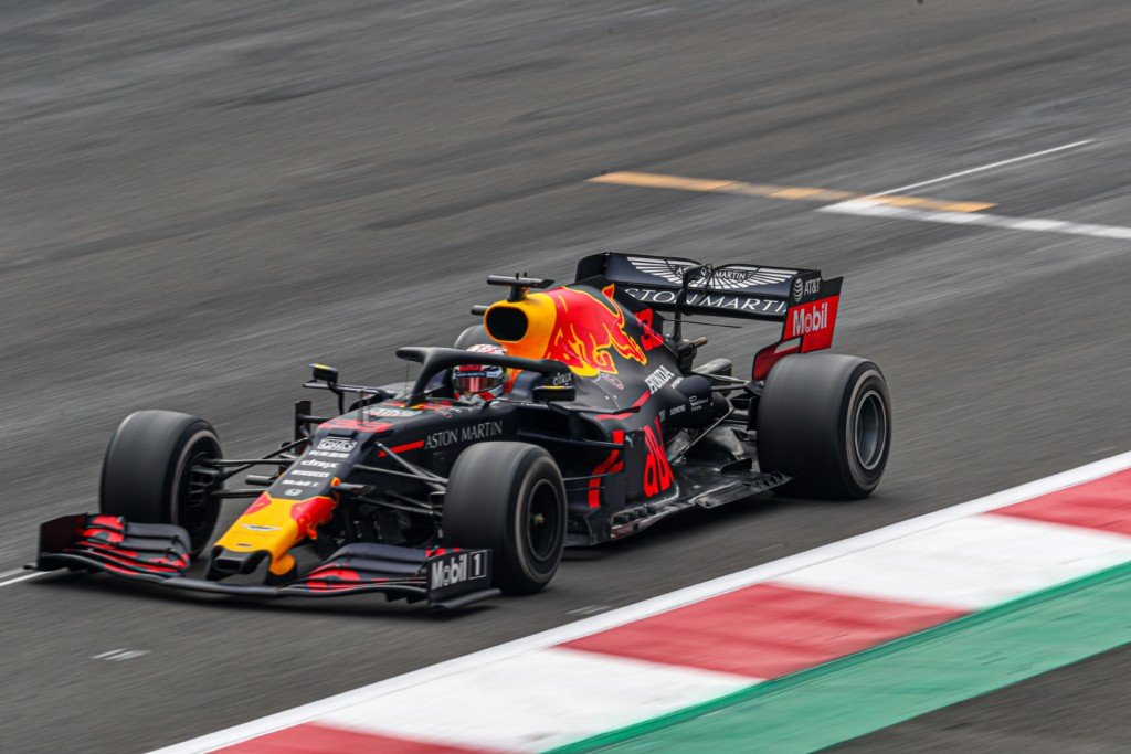 red bull race car on track (Photo by José Pablo Domínguez on Unsplash)