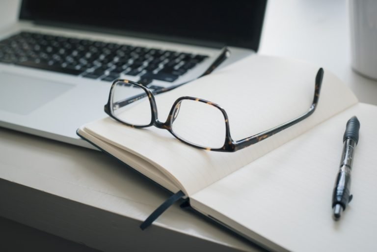 desk prepared for introspection Photo by Trent Erwin on Unsplash