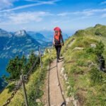 Hiker hiking on a mountain trail