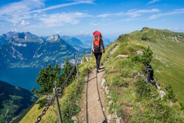 Hiker hiking on a mountain trail