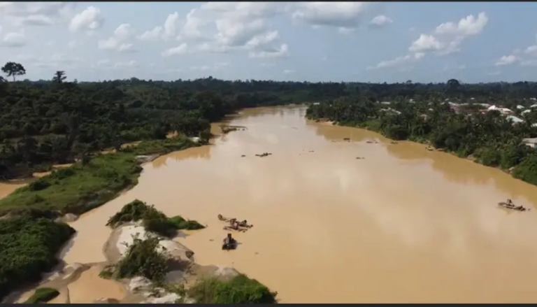 Water body polluted by Galamsey illegal mining from BBC.com