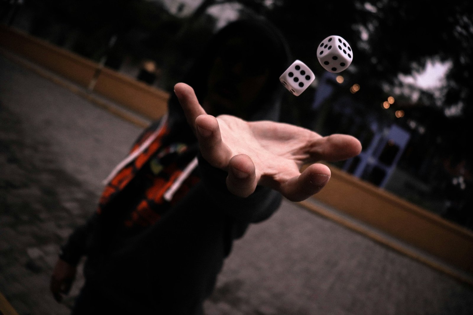 Dice dropping in hand